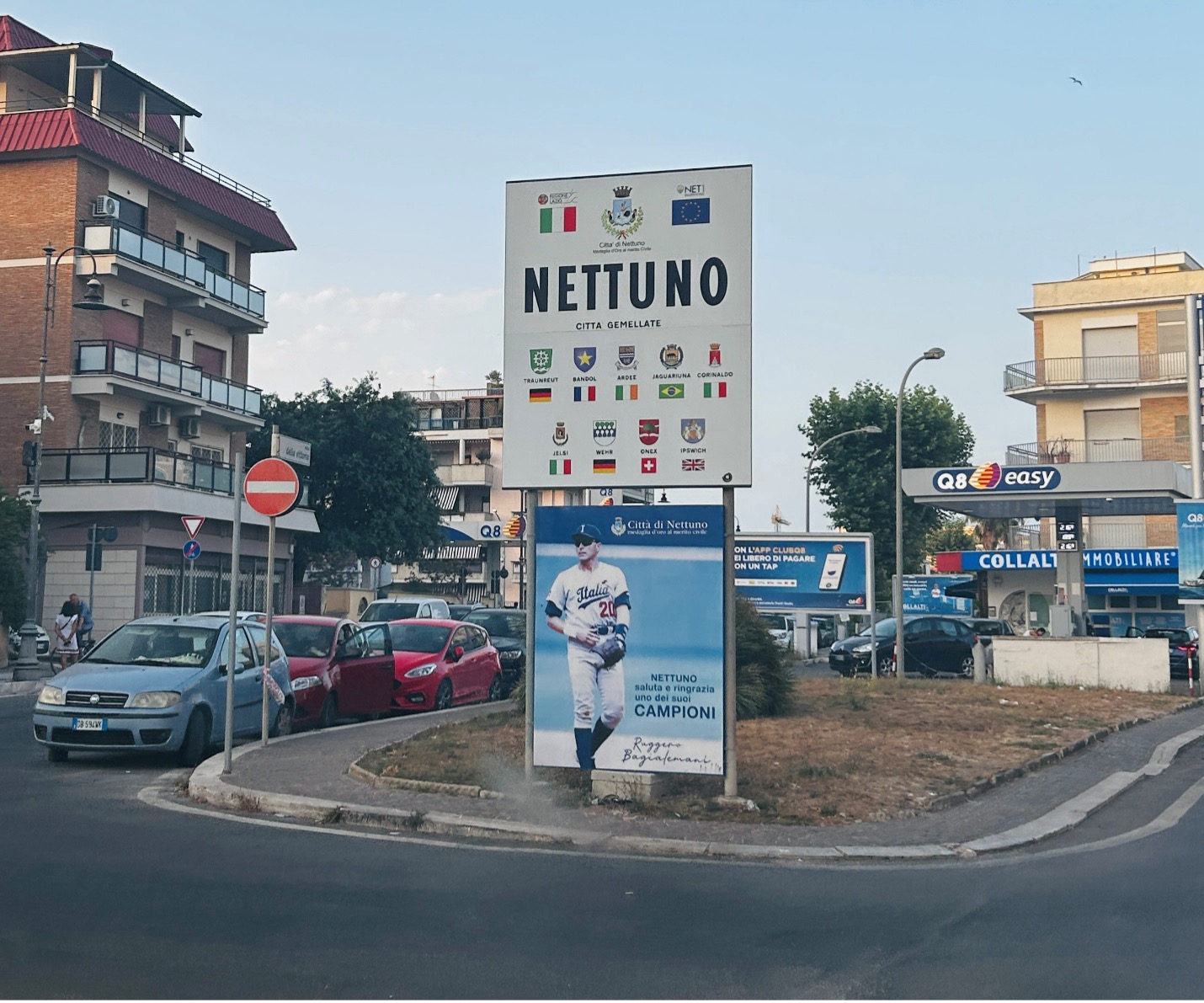 Sign in town square featuring playing-days photo of legendary Nettuno player and manager Ruggero Bagialemani