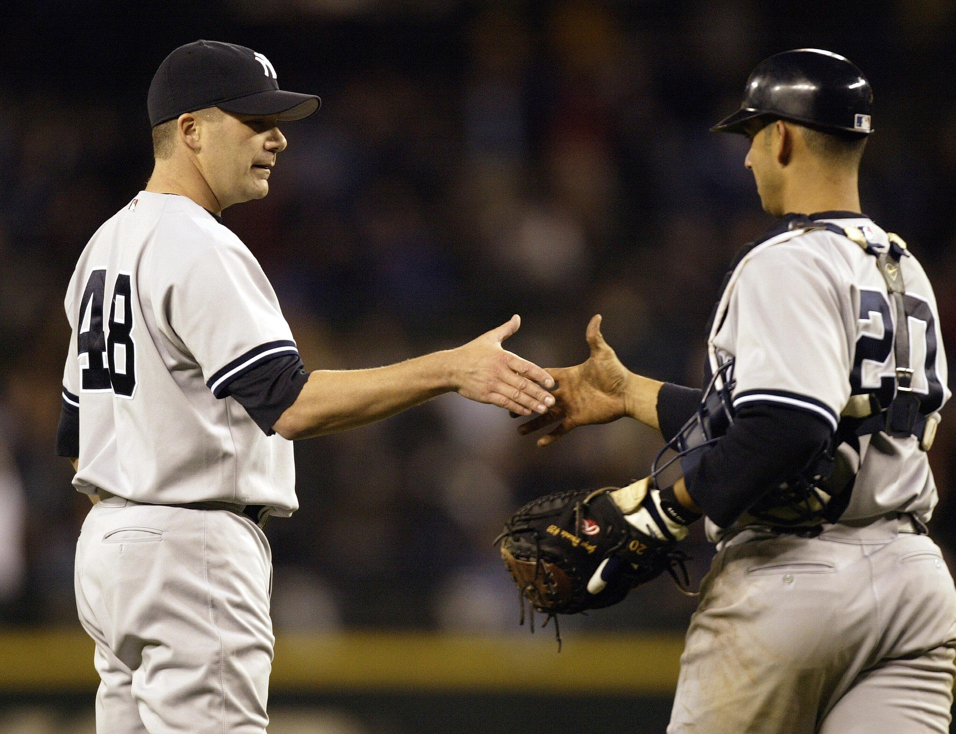 Paul Quantrill and Jorge Posada in 2004