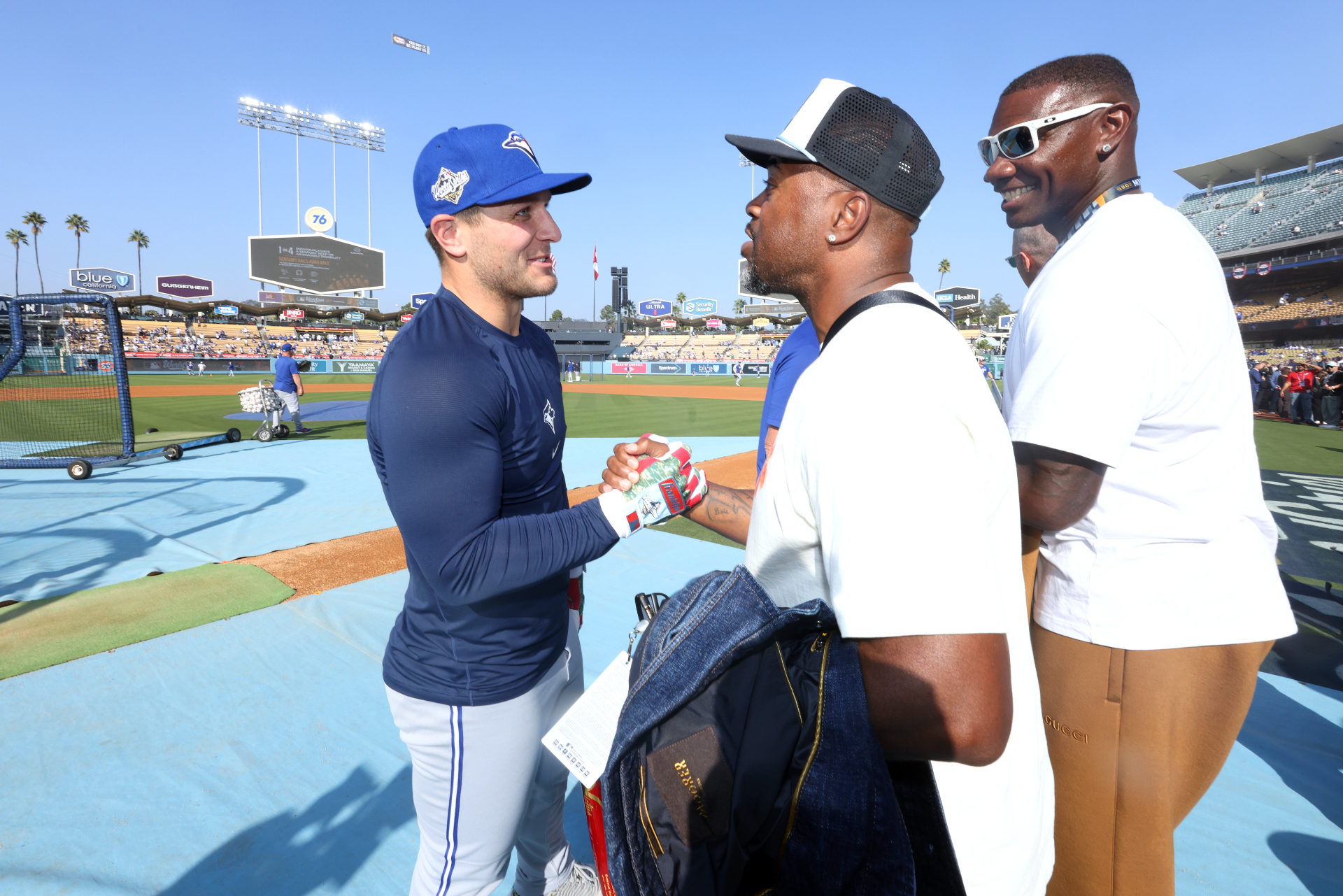 Daulton Varsho meets with Jimmy Rollins and Ryan Howard