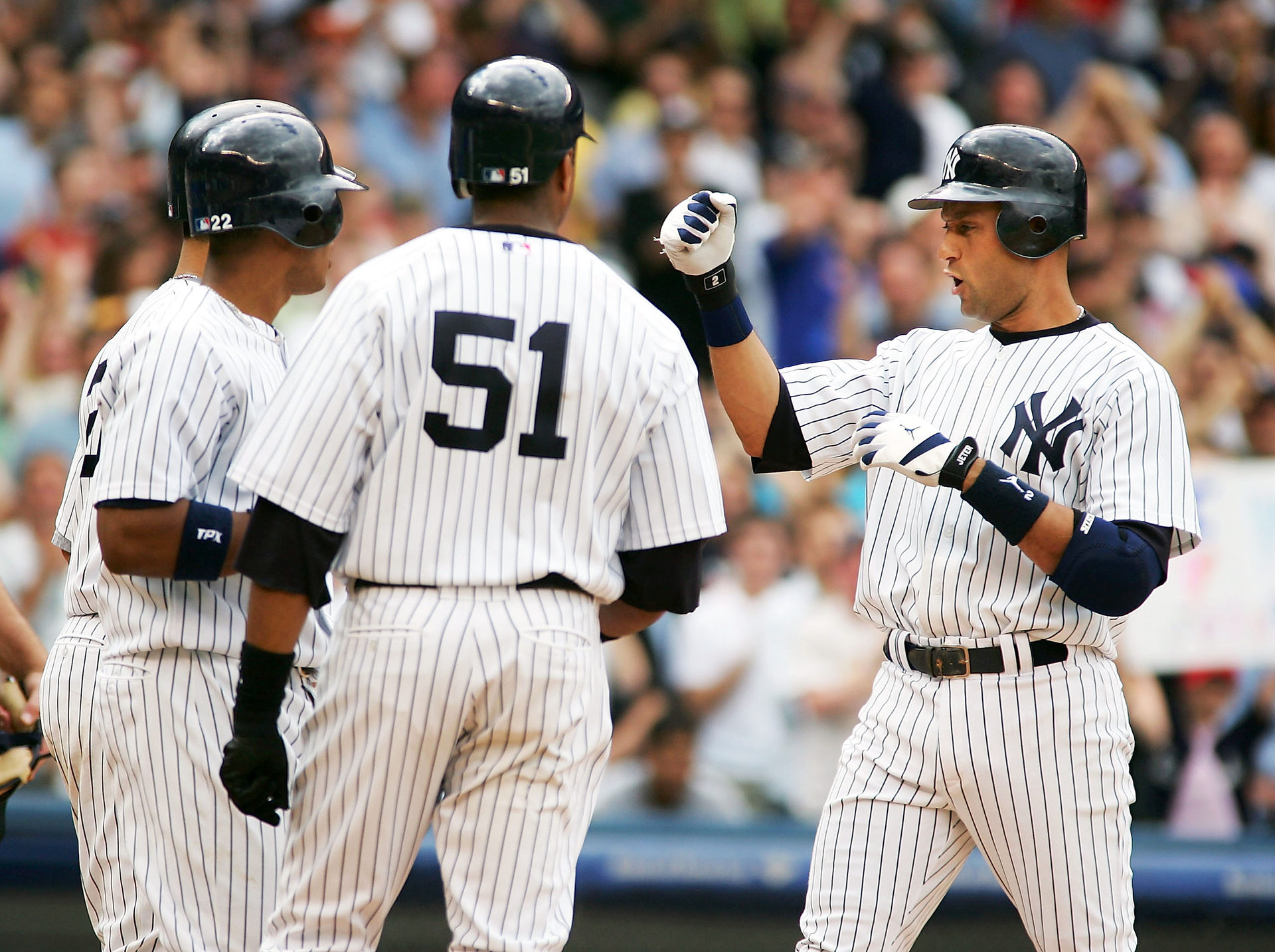 Derek Jeter, Bernie Williams and Robinson Canó