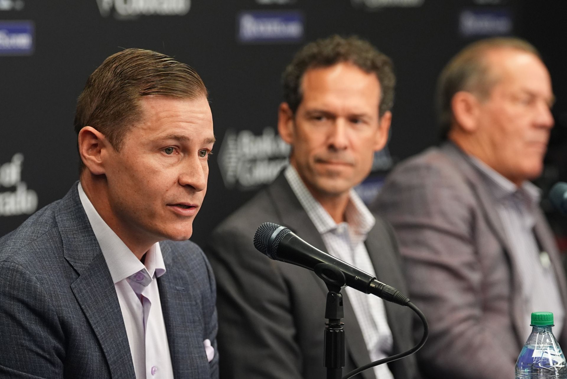 Walker Monfort, Paul DePodesta and Dick Monfort (background)