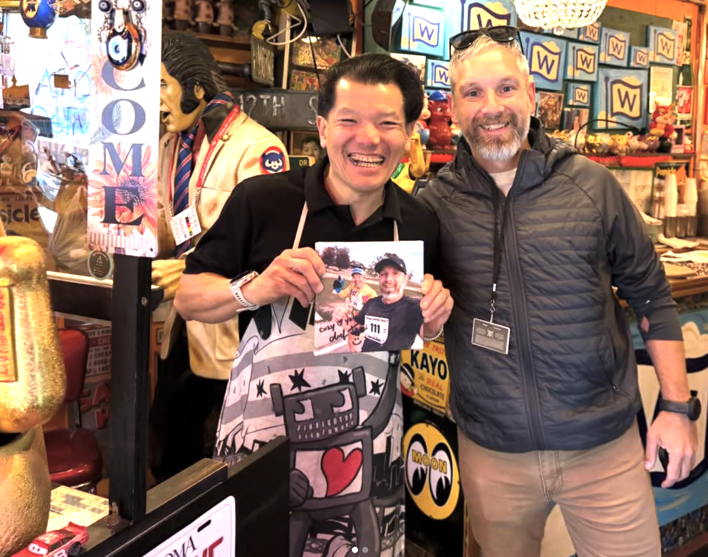 Chef Tee of Cozy Noodles & Rice (left) with Cubs beat writer Jordan Bastian