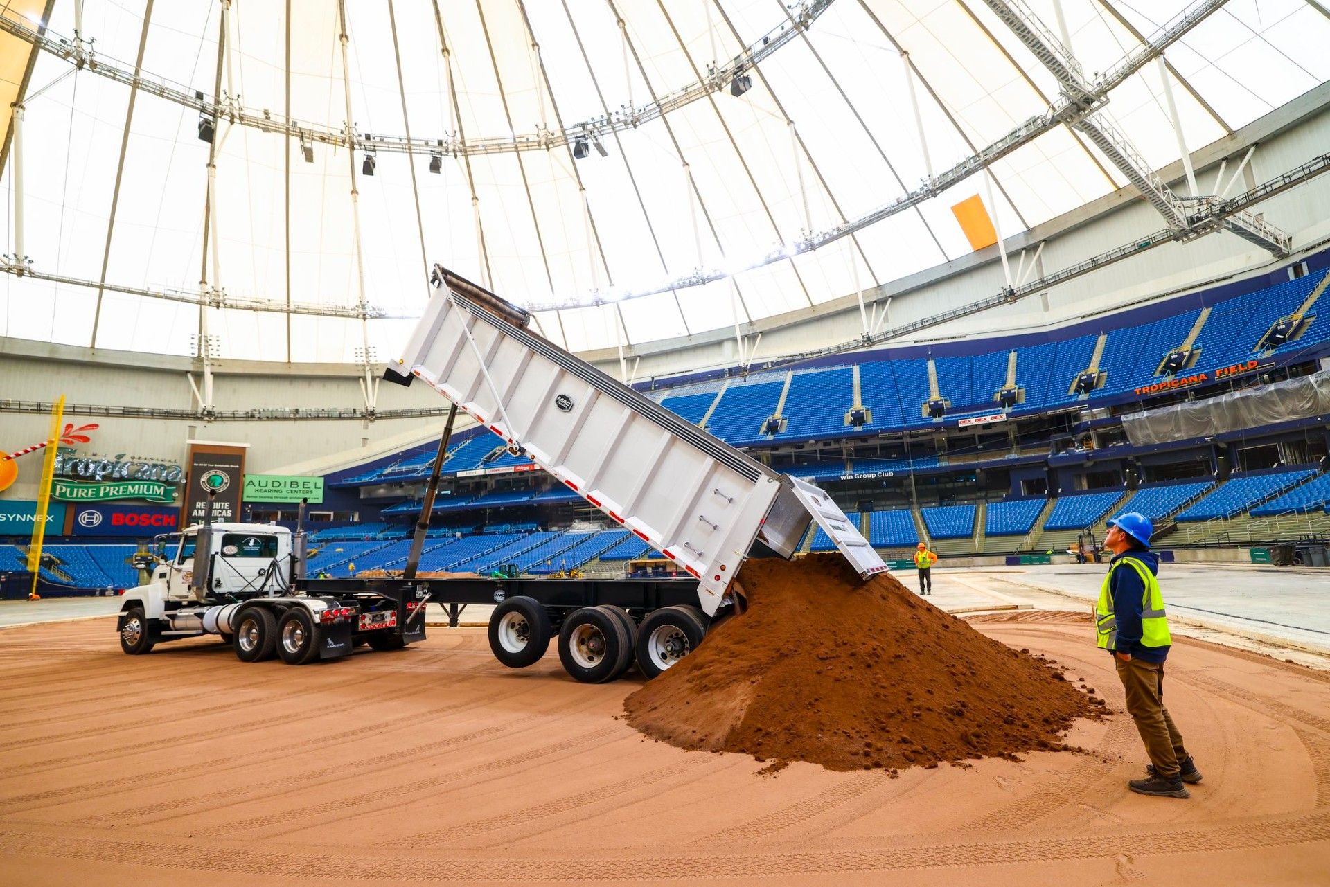 Dirt being delivered at Tropicana Field
