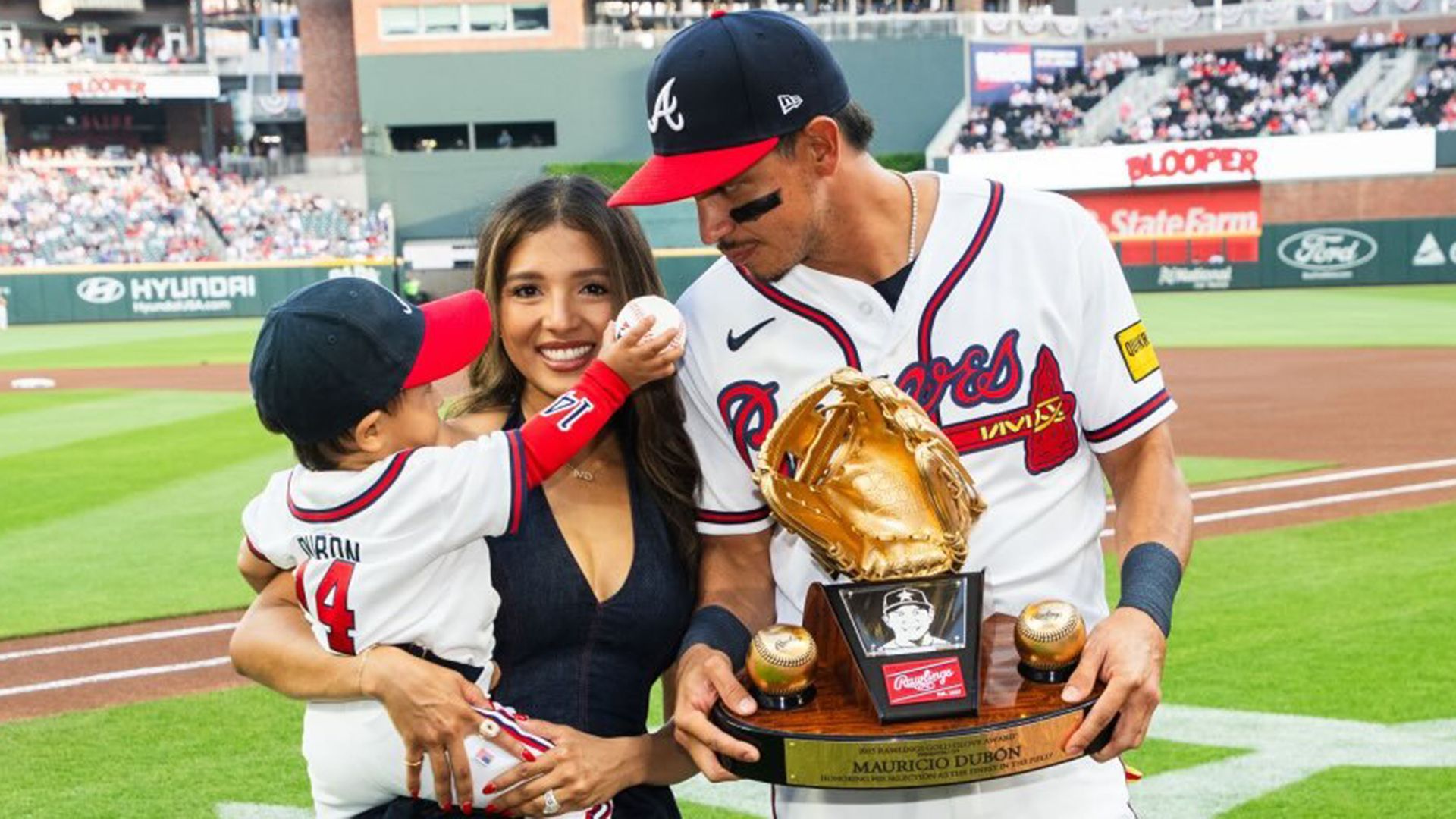 Mauricio Dubón, wife Nancy, and son Luciano