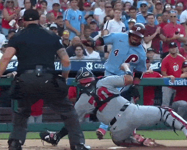 An animated GIF of Luis Arraez trying to avoid a tag