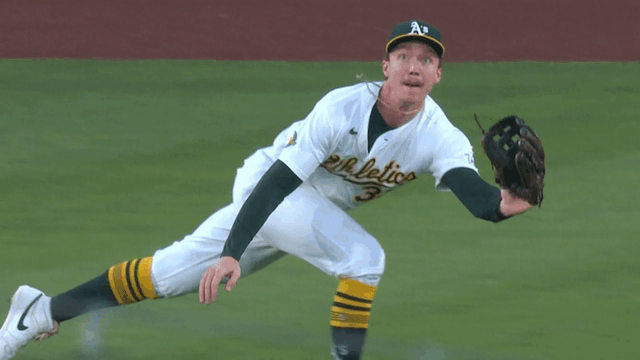 An animated gif of A's outfielder Henry Bolte making a diving catch An animated gif of A's outfielder Henry Bolte making a diving catch
