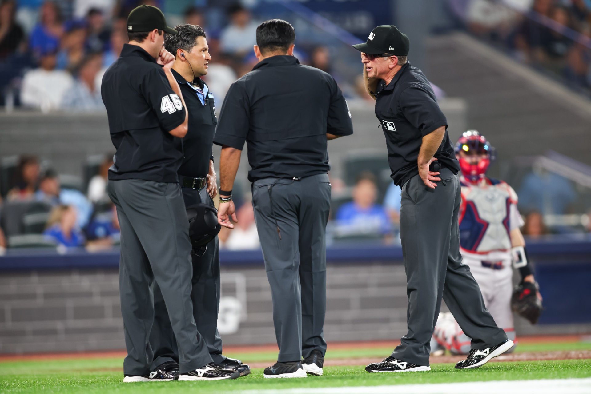 The umpires discuss last night's Red Sox-Blue Jays play