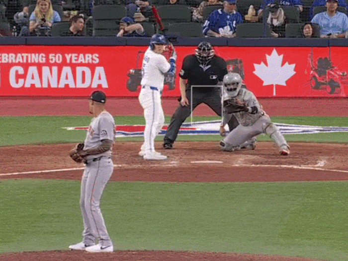 An animated GIF of Daulton Varsho and Bobby Witt Jr. swinging at far outside pitches