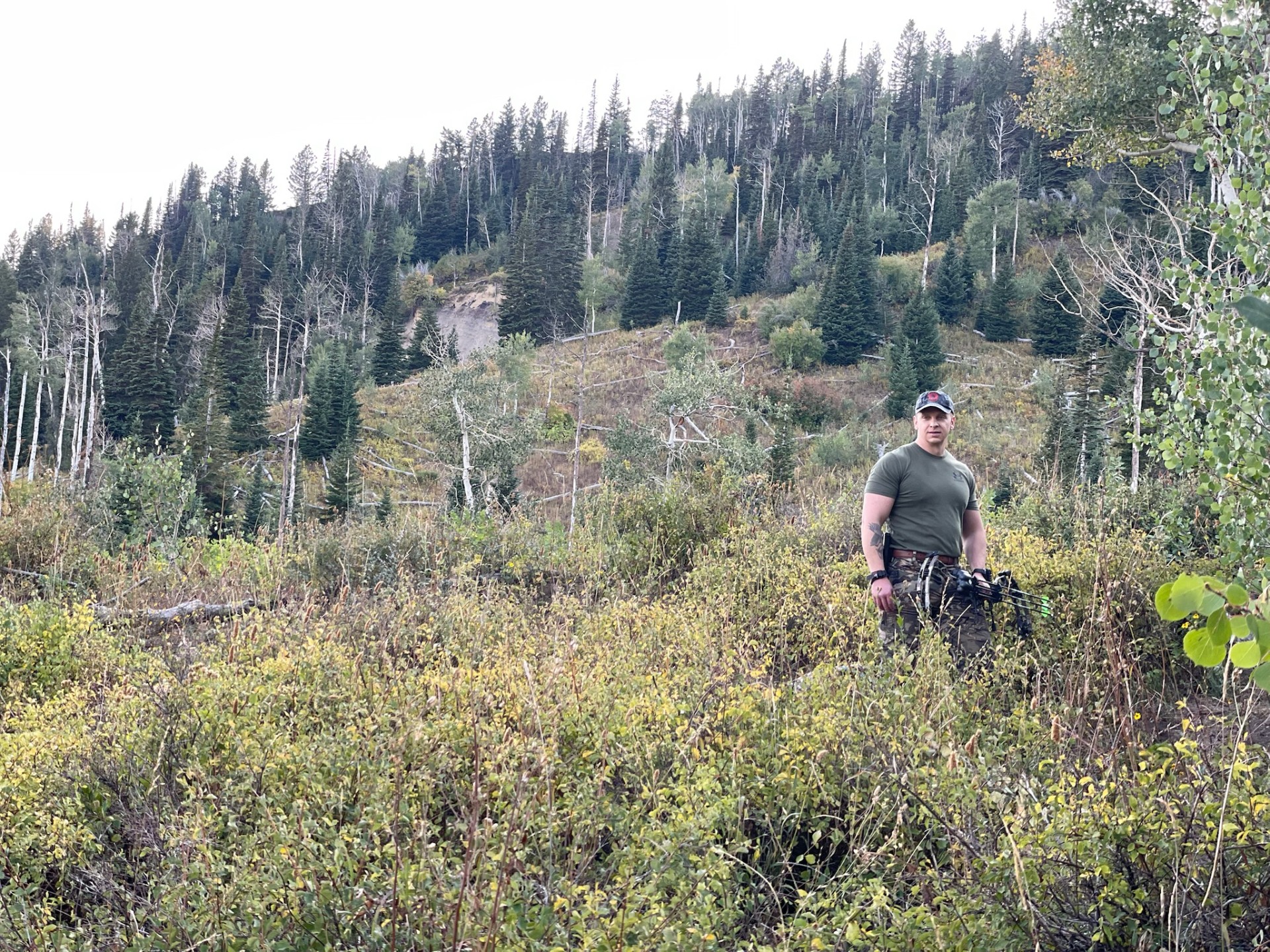 Photo of Evan bow hunting
